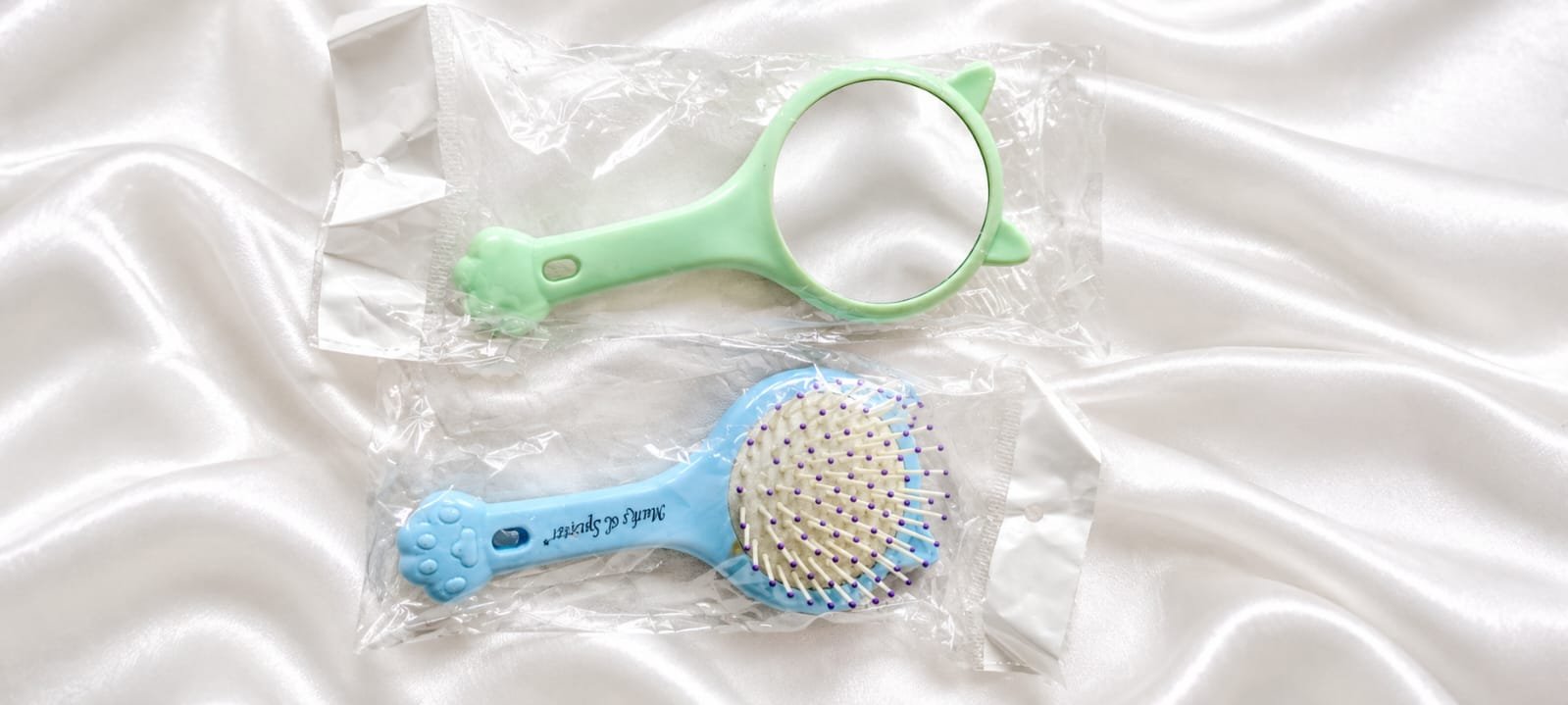 Cute handheld hair brush with matching mirror